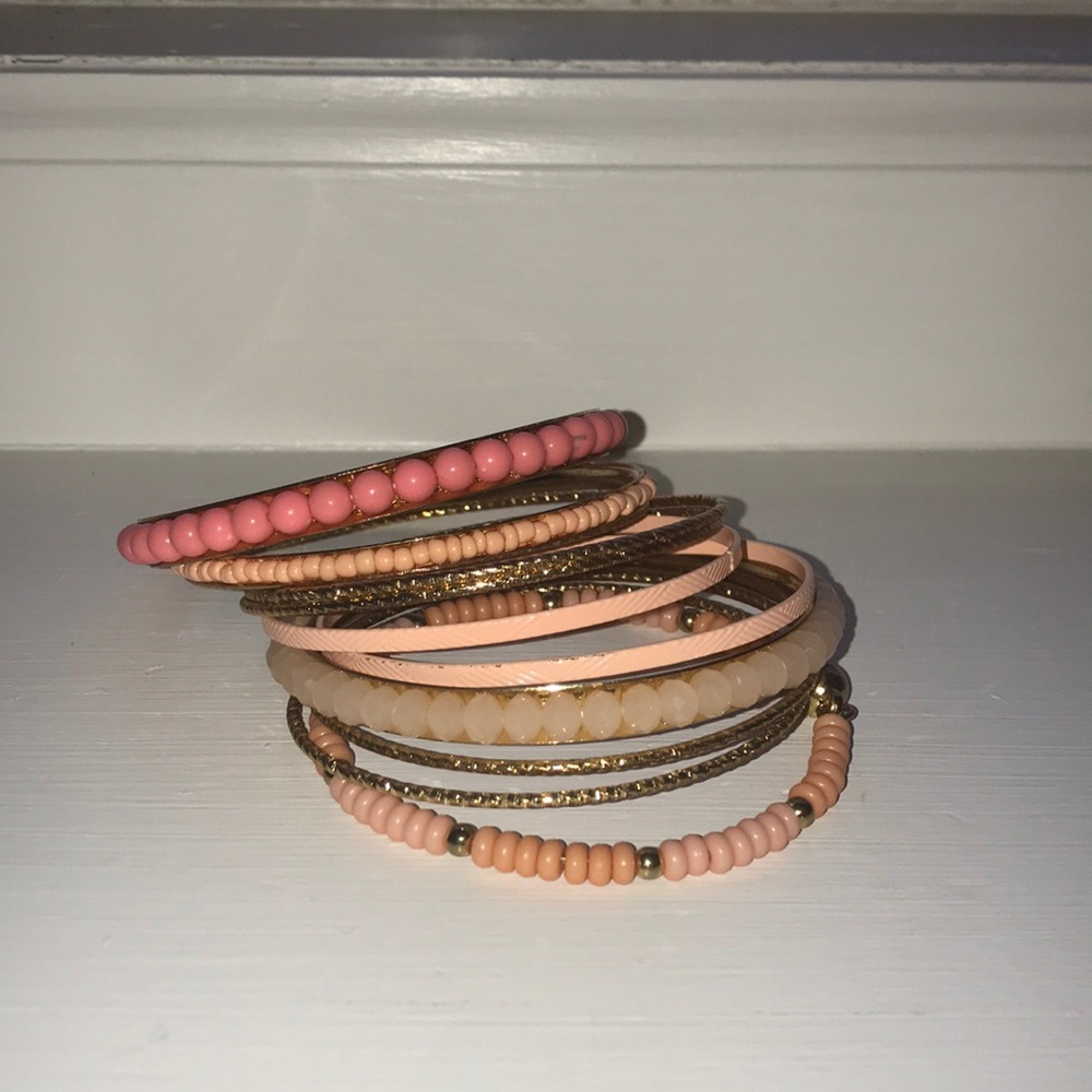 set of 11 pink and gold bracelets 💗💗